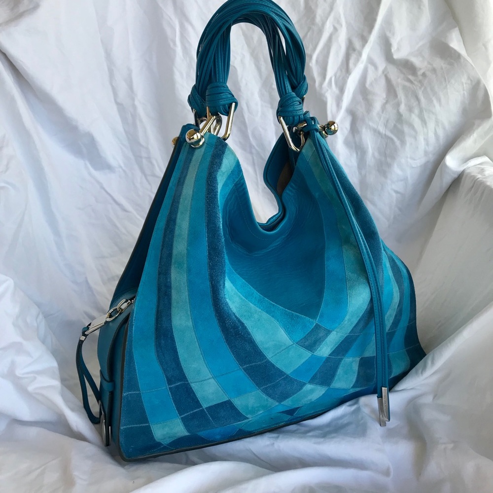 Stuart Weitzman three compartment sh bag.